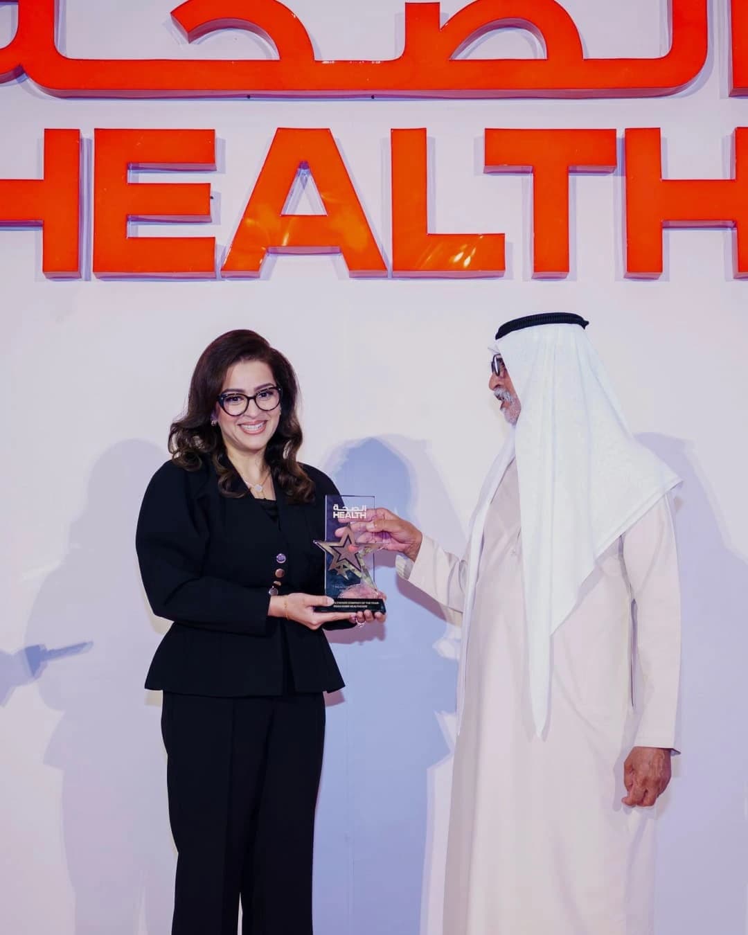 Dr. Nadia Choudhry receiving the Health Magazine award